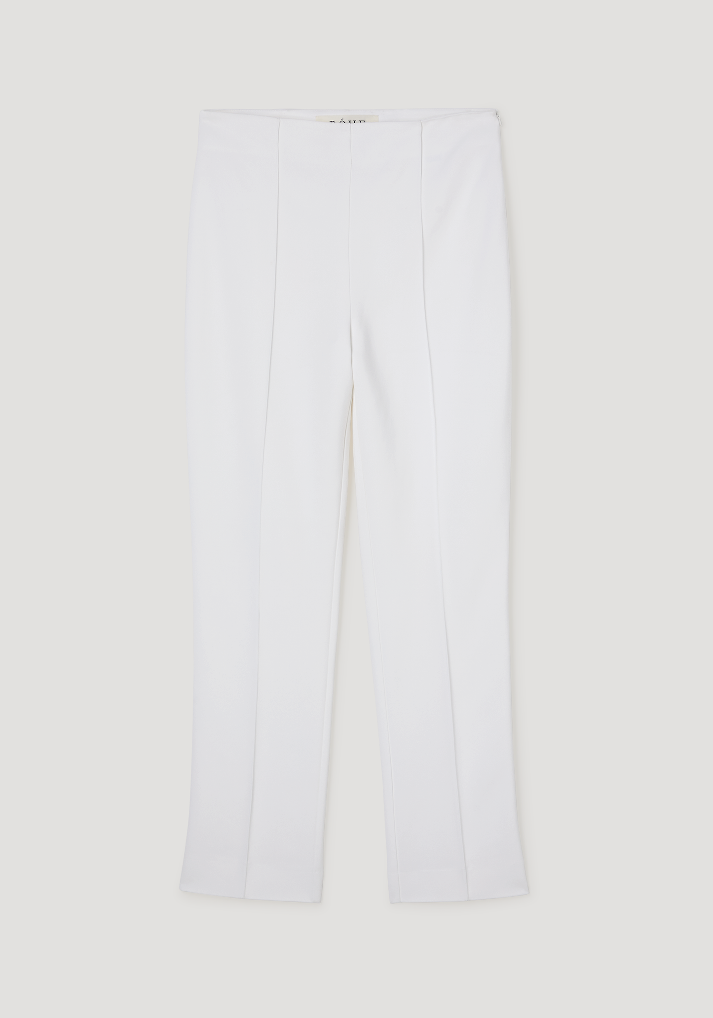 White pants on a light beige background