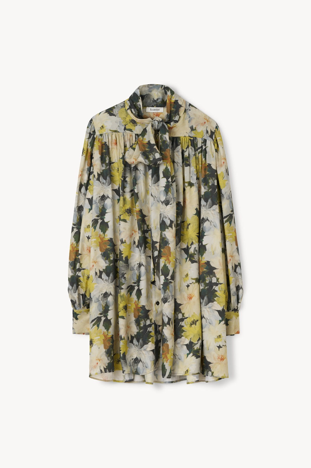 A long-sleeve, high-neck blouse with a gathered waist and an abstract floral print in yellow, olive green, and gray on a light beige base, shown against a plain off-white background.