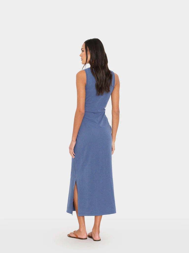 Woman wearing a blue dress on a white background