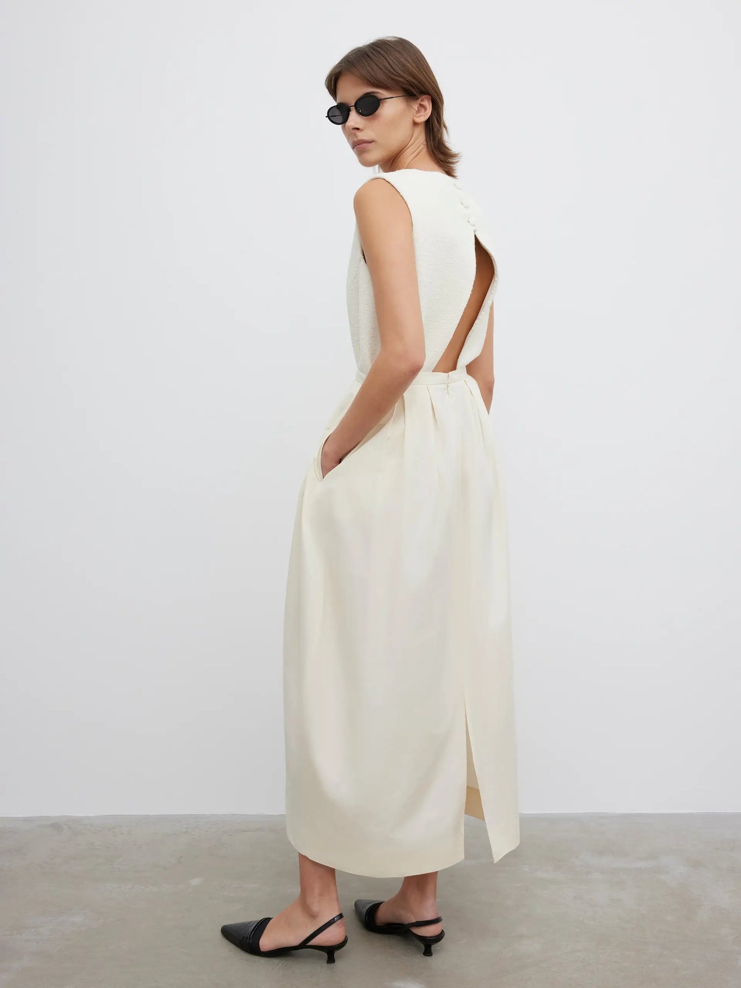 Curved pleated skirt