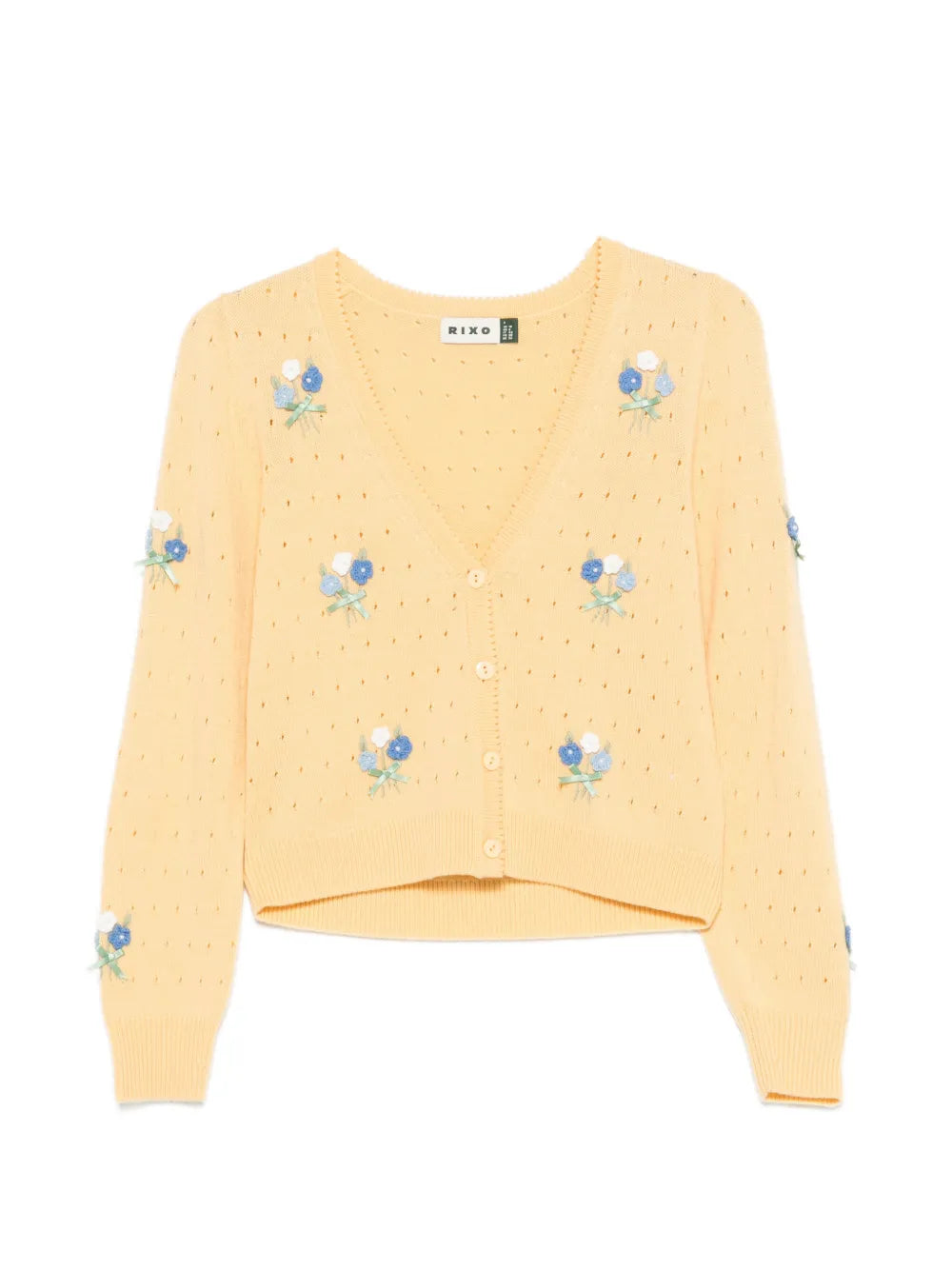 Yellow sweater with floral embroidery on a white background