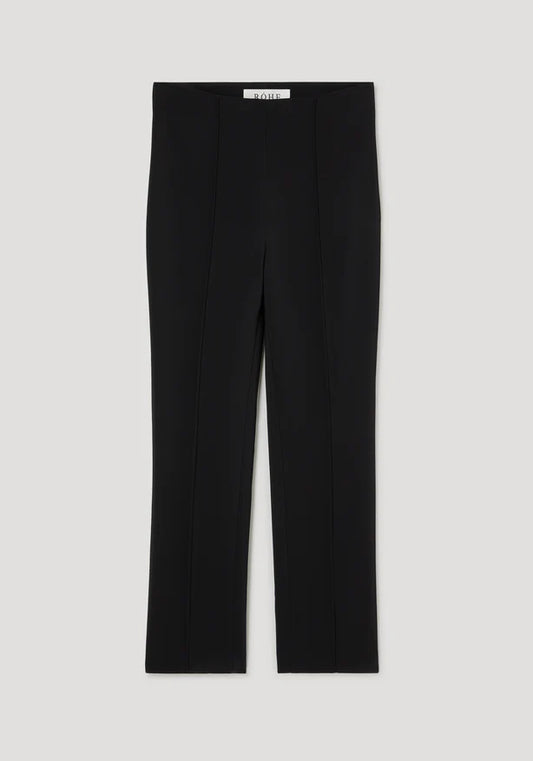 Black pants on a light gray background