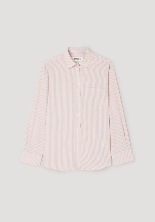 A light pink and white vertically striped long-sleeve button-down shirt with a collar and chest pocket, displayed flat against a light gray background.