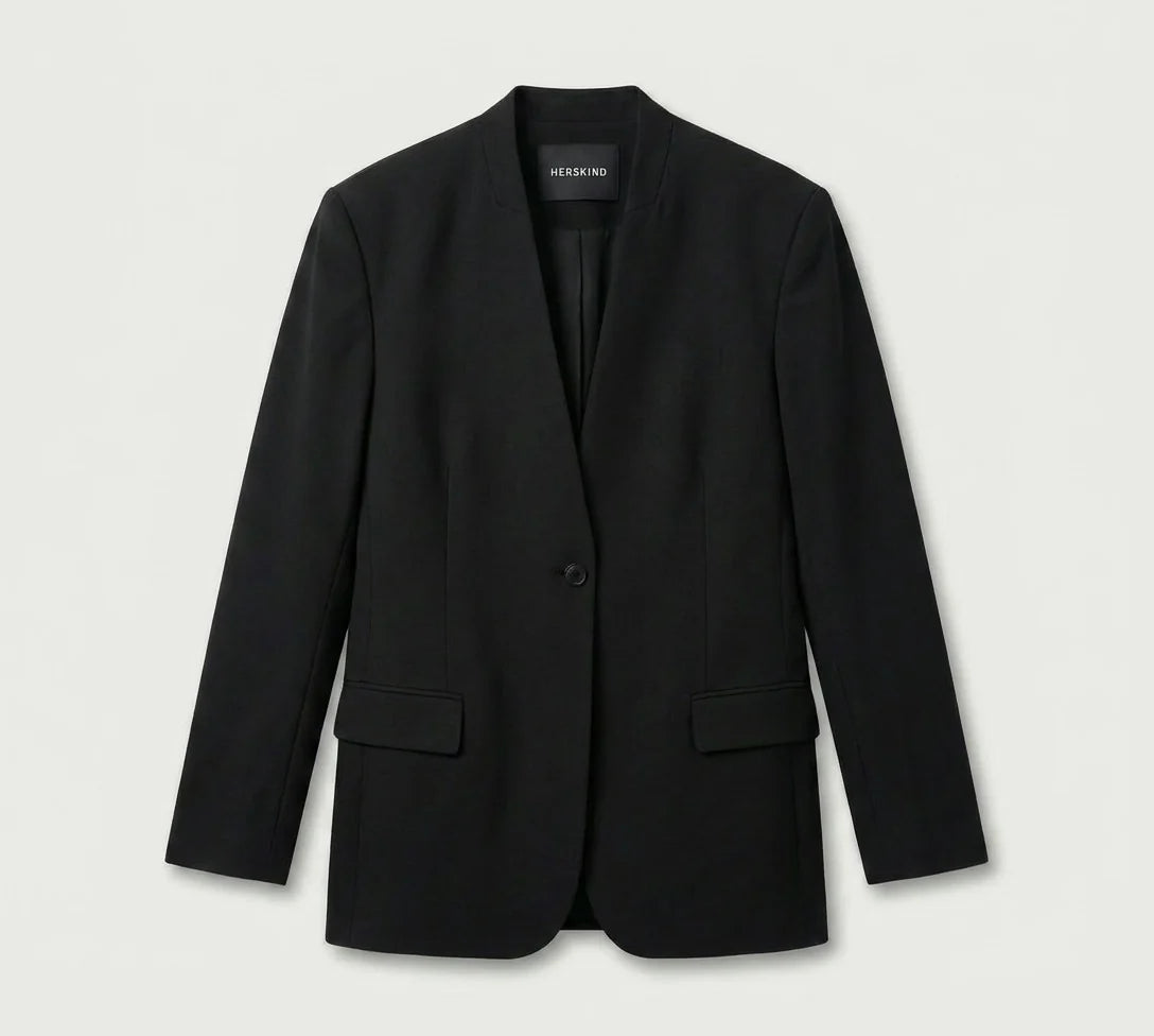 Black blazer on a light gray background