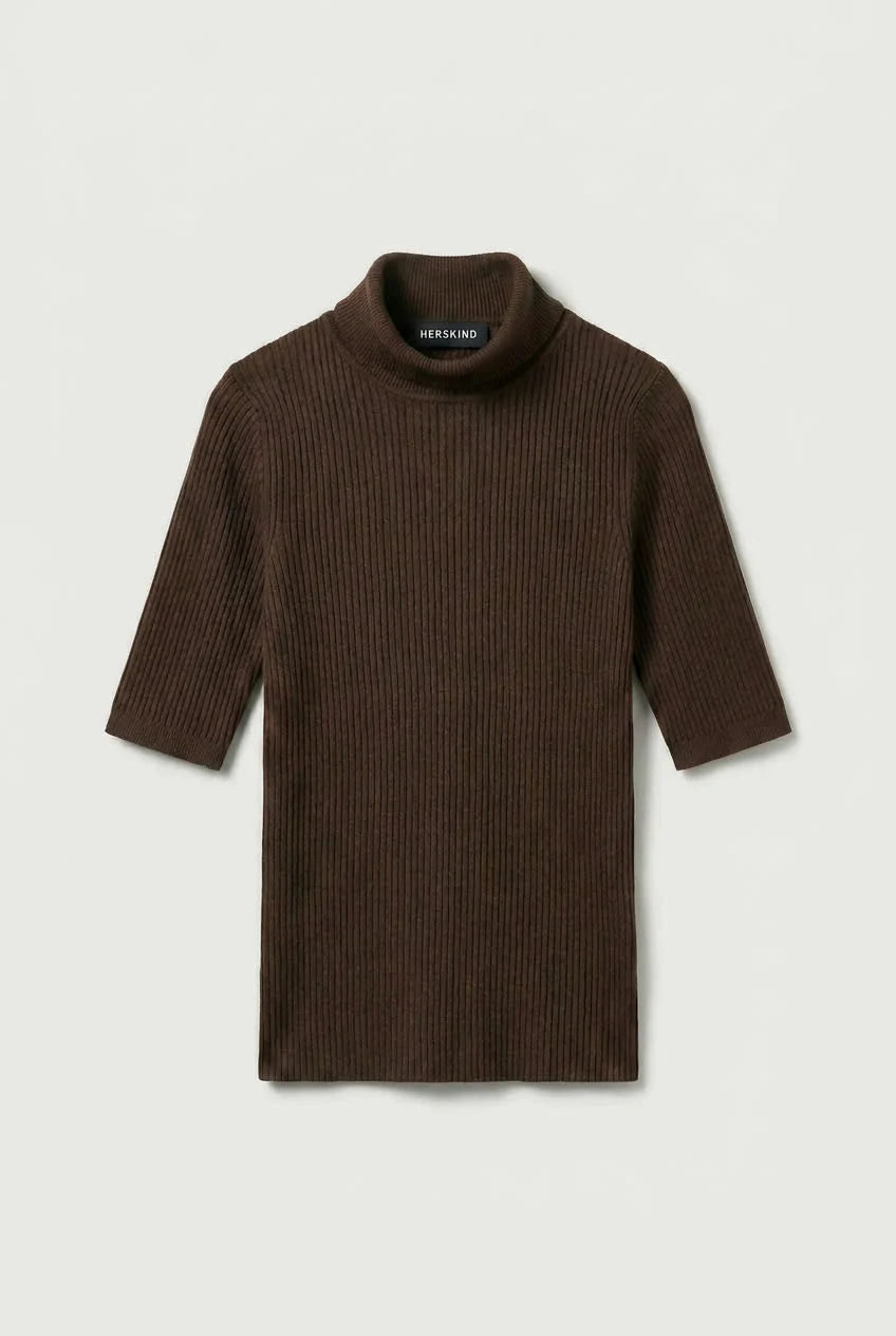 Brown ribbed turtleneck sweater on a light gray background