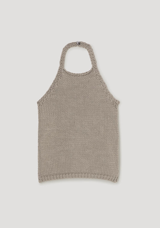 Knitted tank top on a light gray background