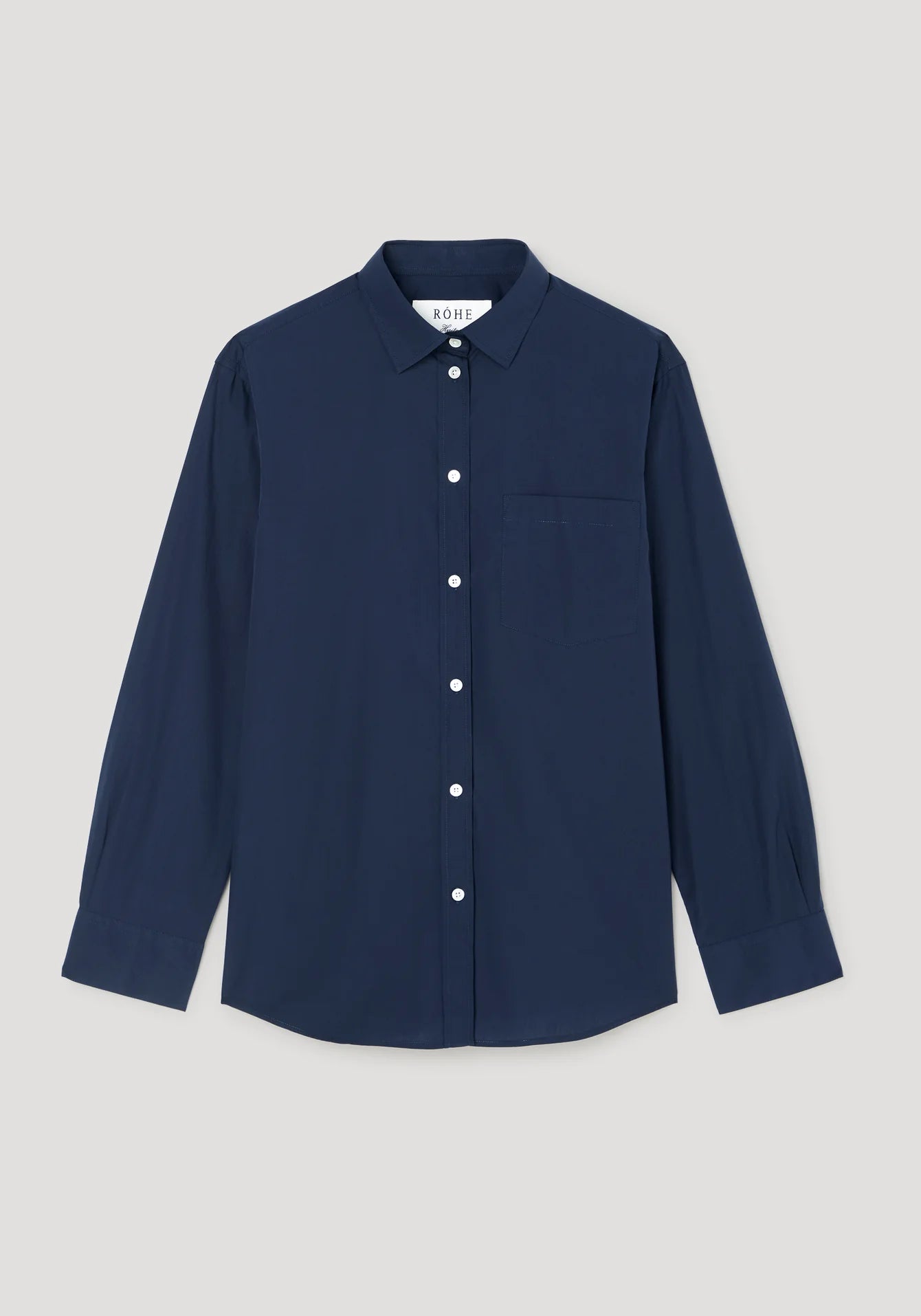 Navy blue shirt on a light gray background