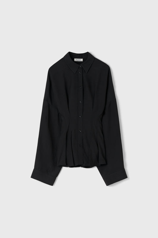 A black long-sleeve button-up shirt with a pointed collar and a subtle peplum-like gathered waist detail, displayed flat against a light gray background.
