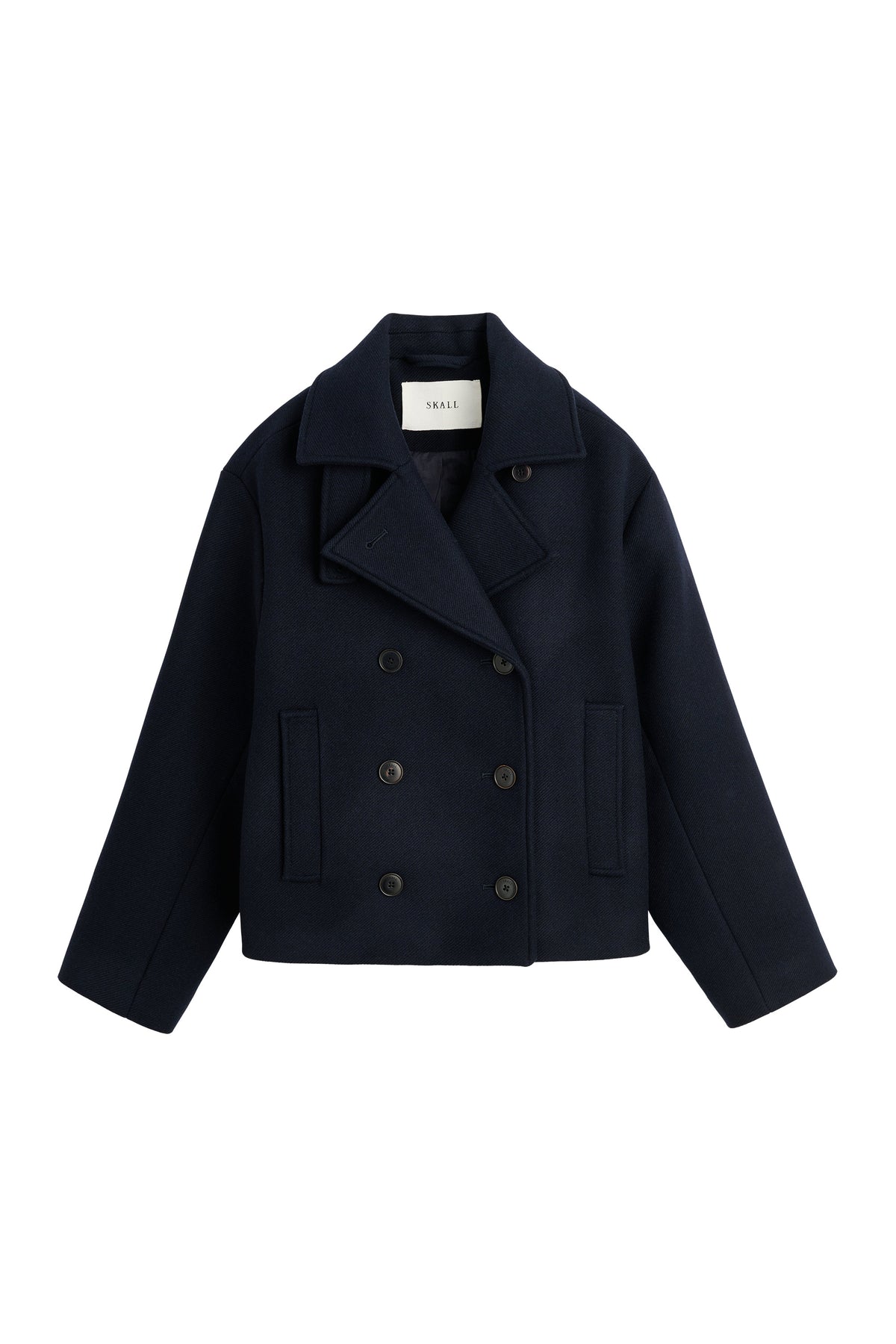 A dark navy blue cropped double-breasted coat with wide lapels and dark buttons, displayed flat against a solid white background.