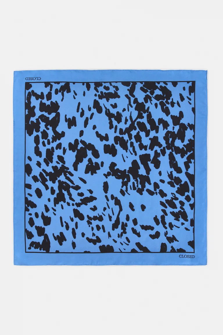 Blue scarf with black abstract pattern on a white background