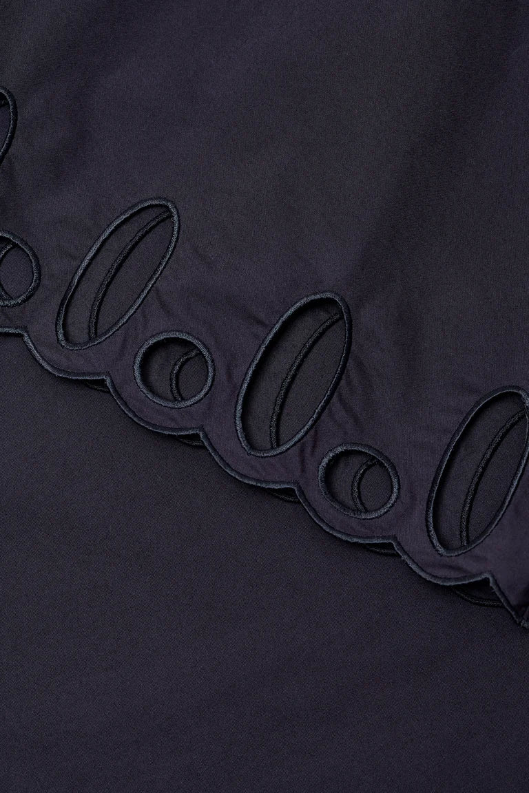 Navy blue fabric with decorative black stitching