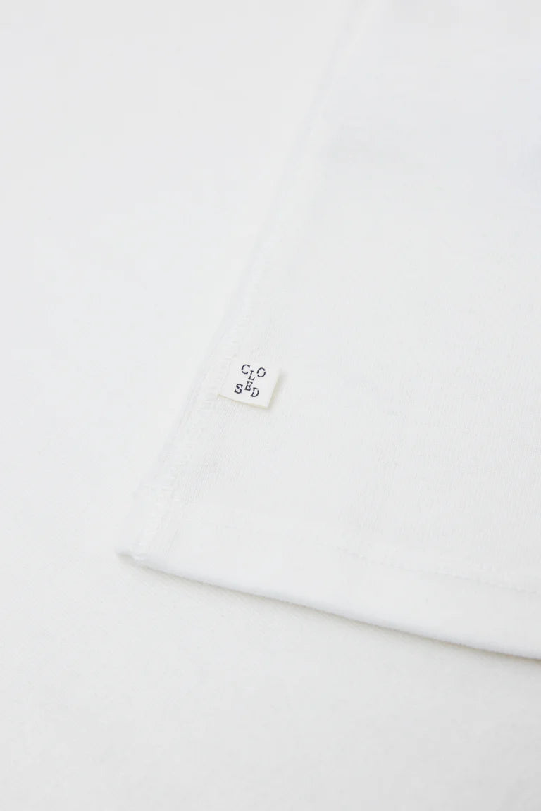 Small white square with text on a light gray background