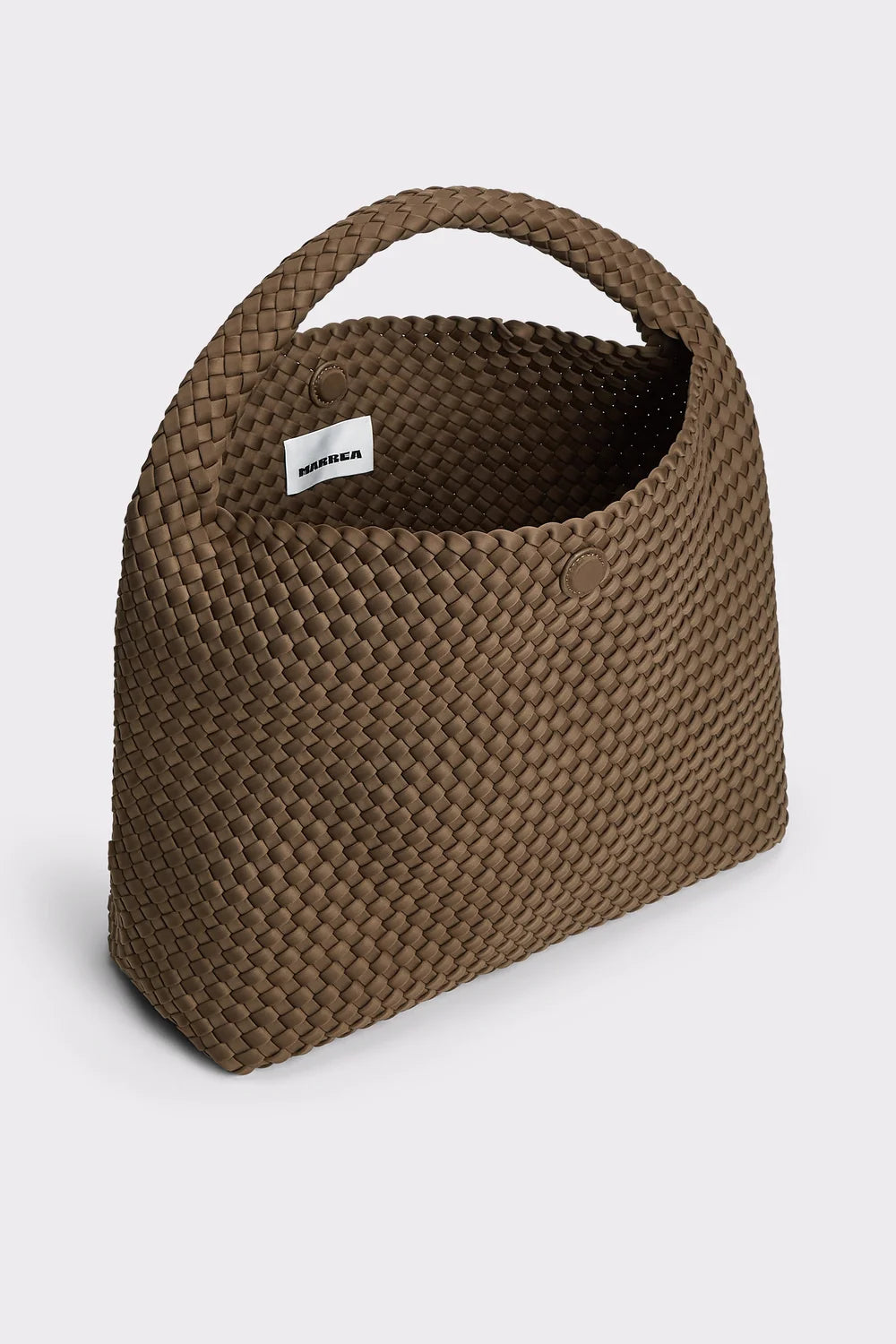 A brown woven leather handbag with a top handle, shown at an angle on a light gray background. A small white label with the brand name 'MISLANA' is visible on the upper left side.