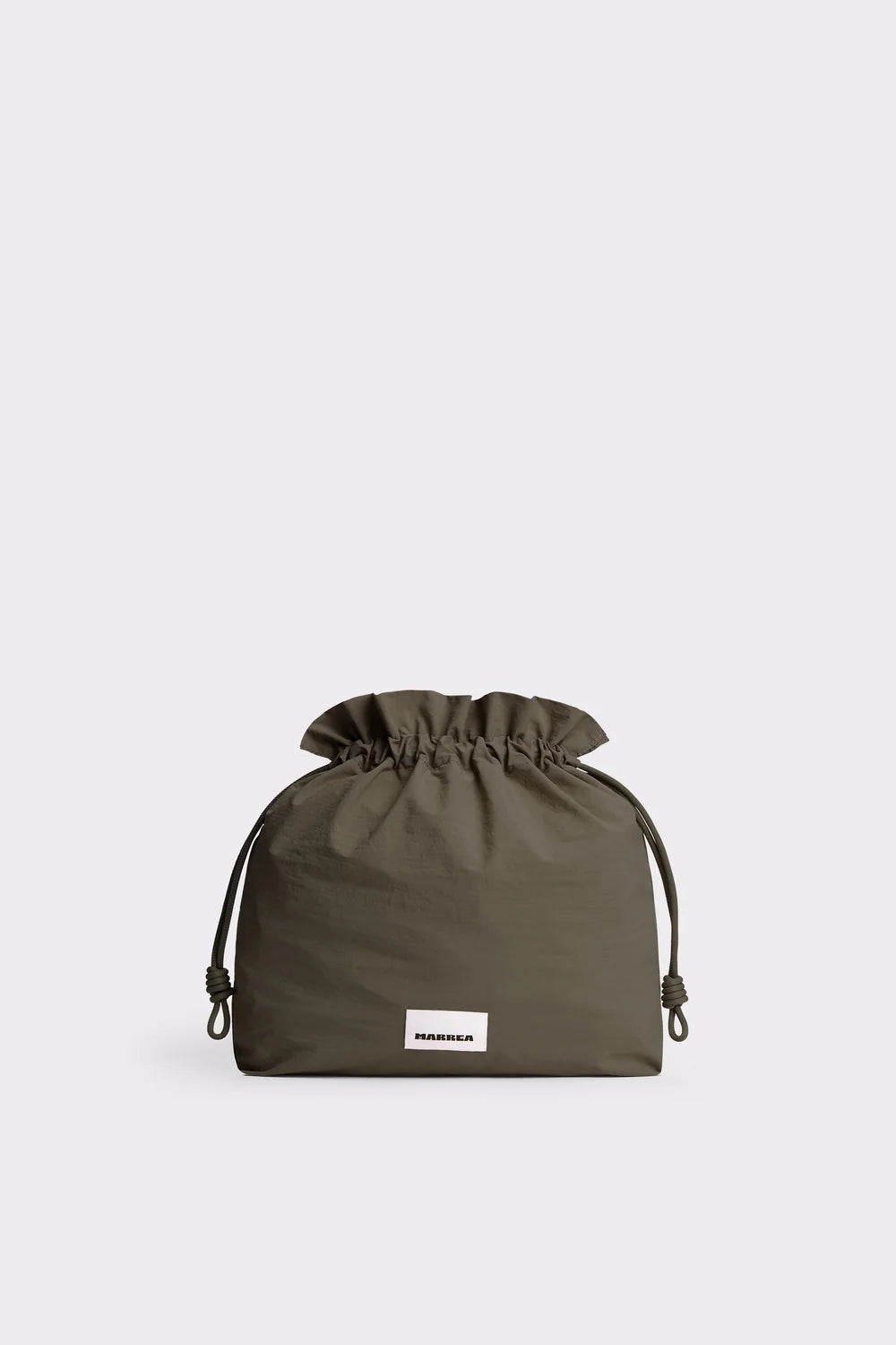 An olive green drawstring pouch with a small white rectangular brand label on the front, set against a solid light gray background.
