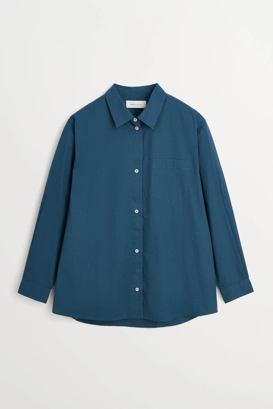 A slate blue long-sleeve button-up shirt with a pointed collar and a chest pocket, displayed flat against a light gray background.