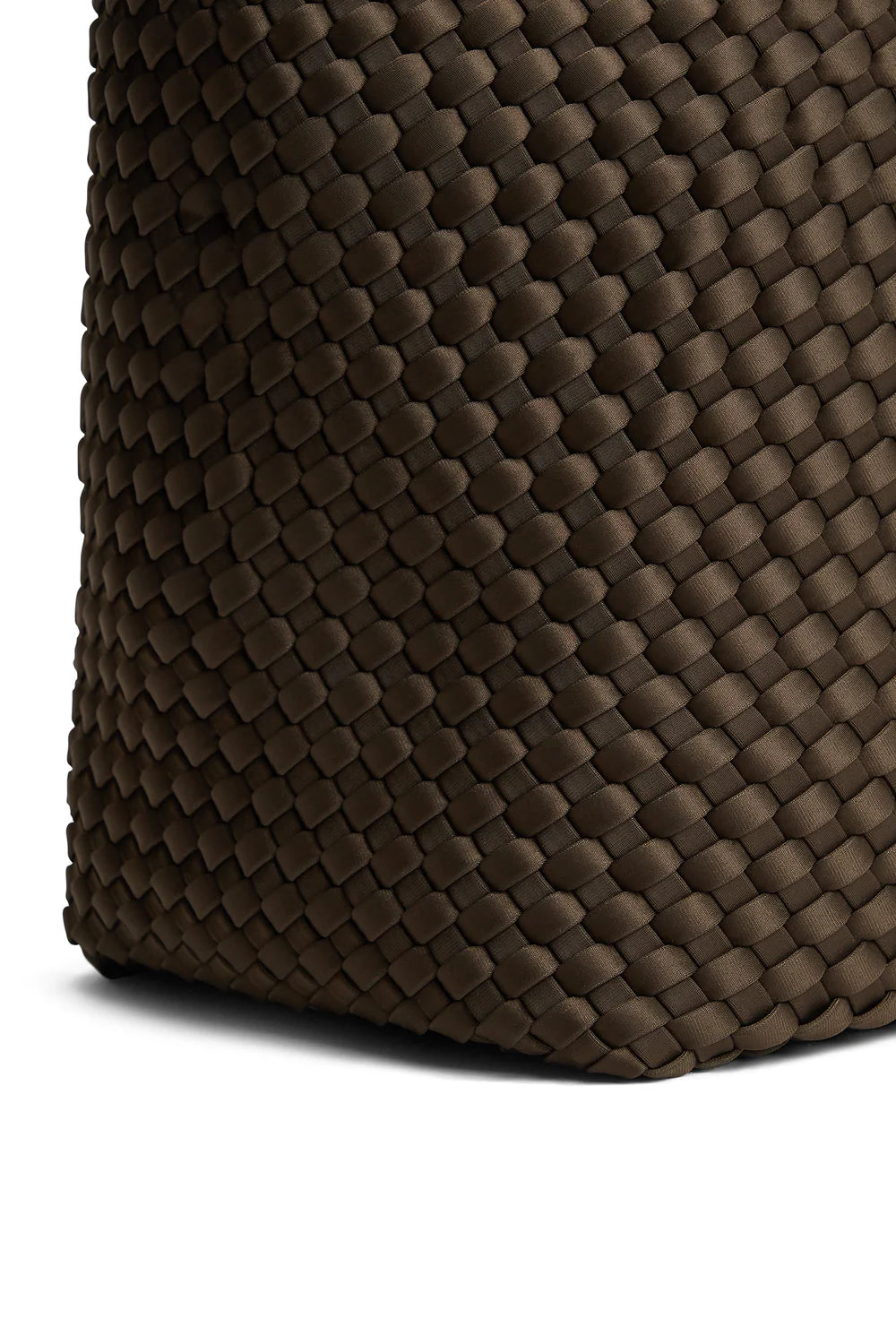 Close-up of a dark brown woven basket or bag corner showing the detailed interlaced texture against a white background.
