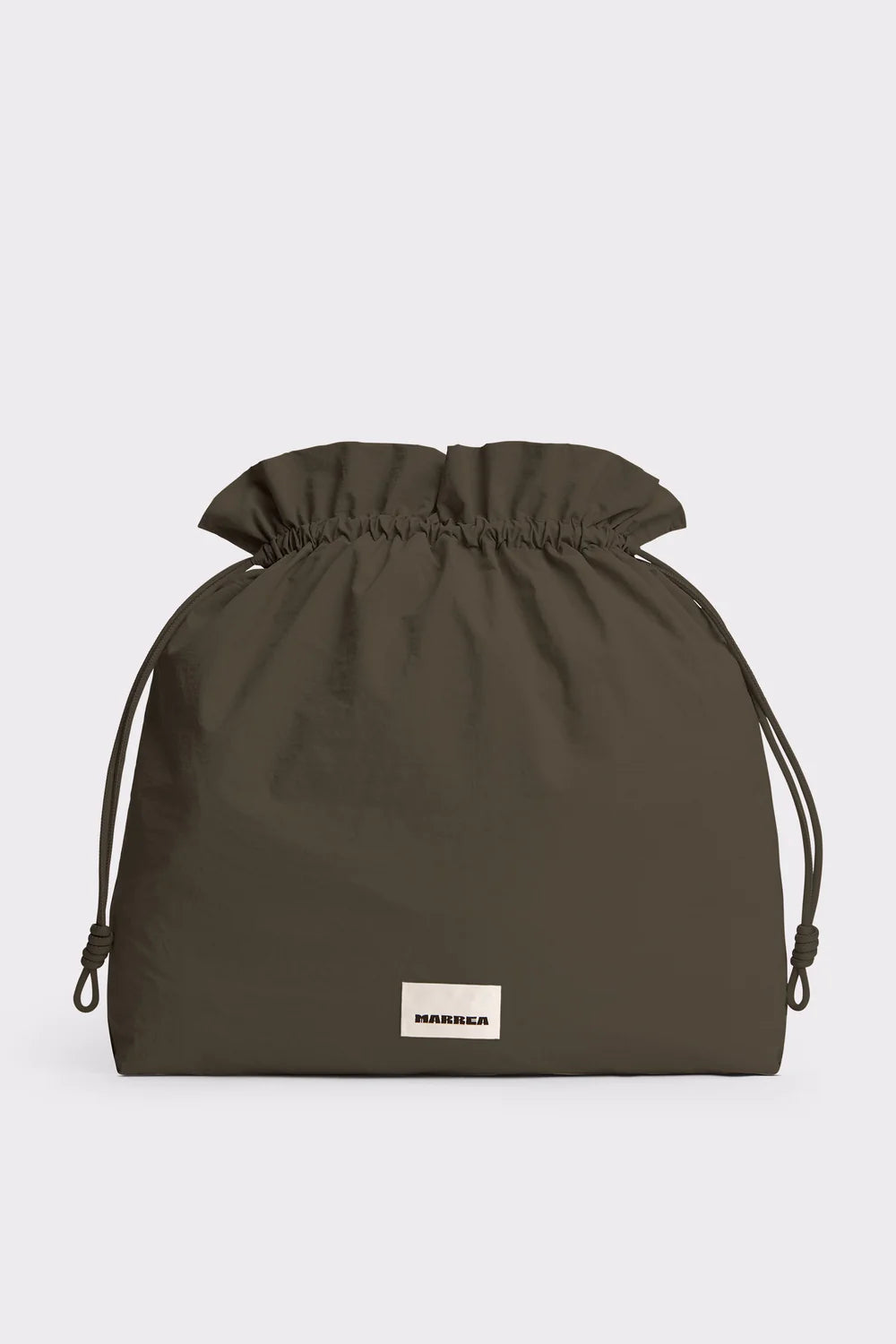 Dark green drawstring bag with a brand label on a light gray background