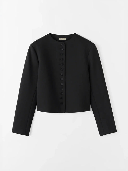 Black jacket with buttons on a white background