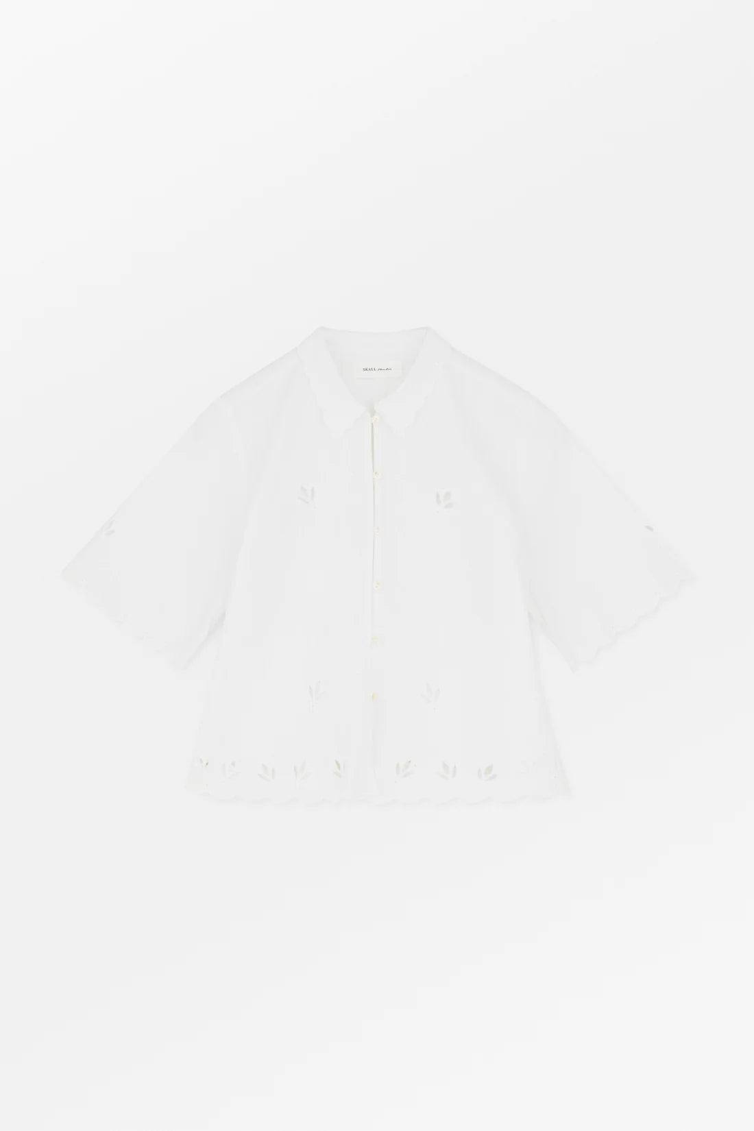 Plain white t-shirt on a light gray background