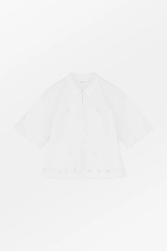 Plain white t-shirt on a light gray background