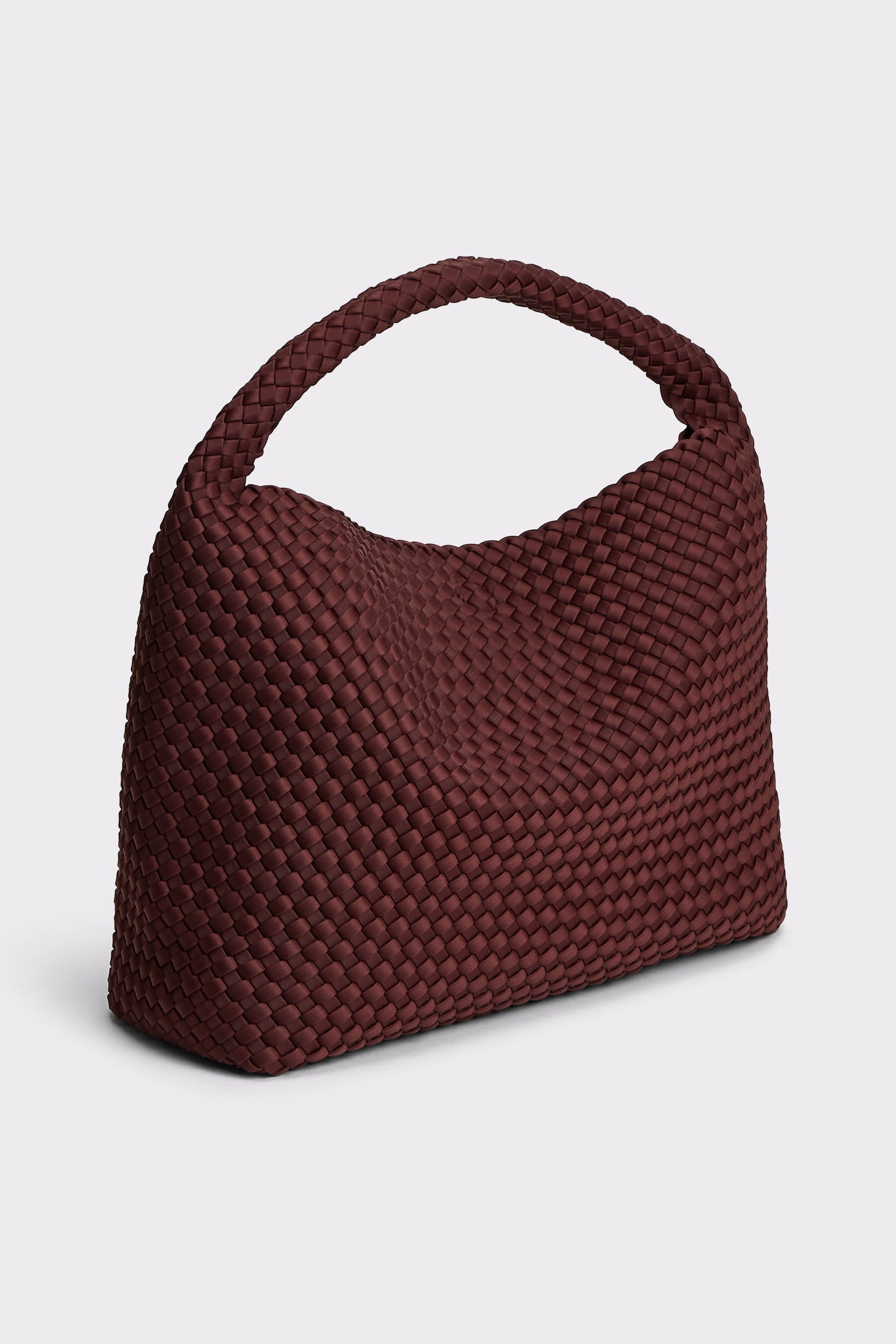 A dark burgundy woven leather shoulder bag with a single integrated handle, shown on a light gray background.
