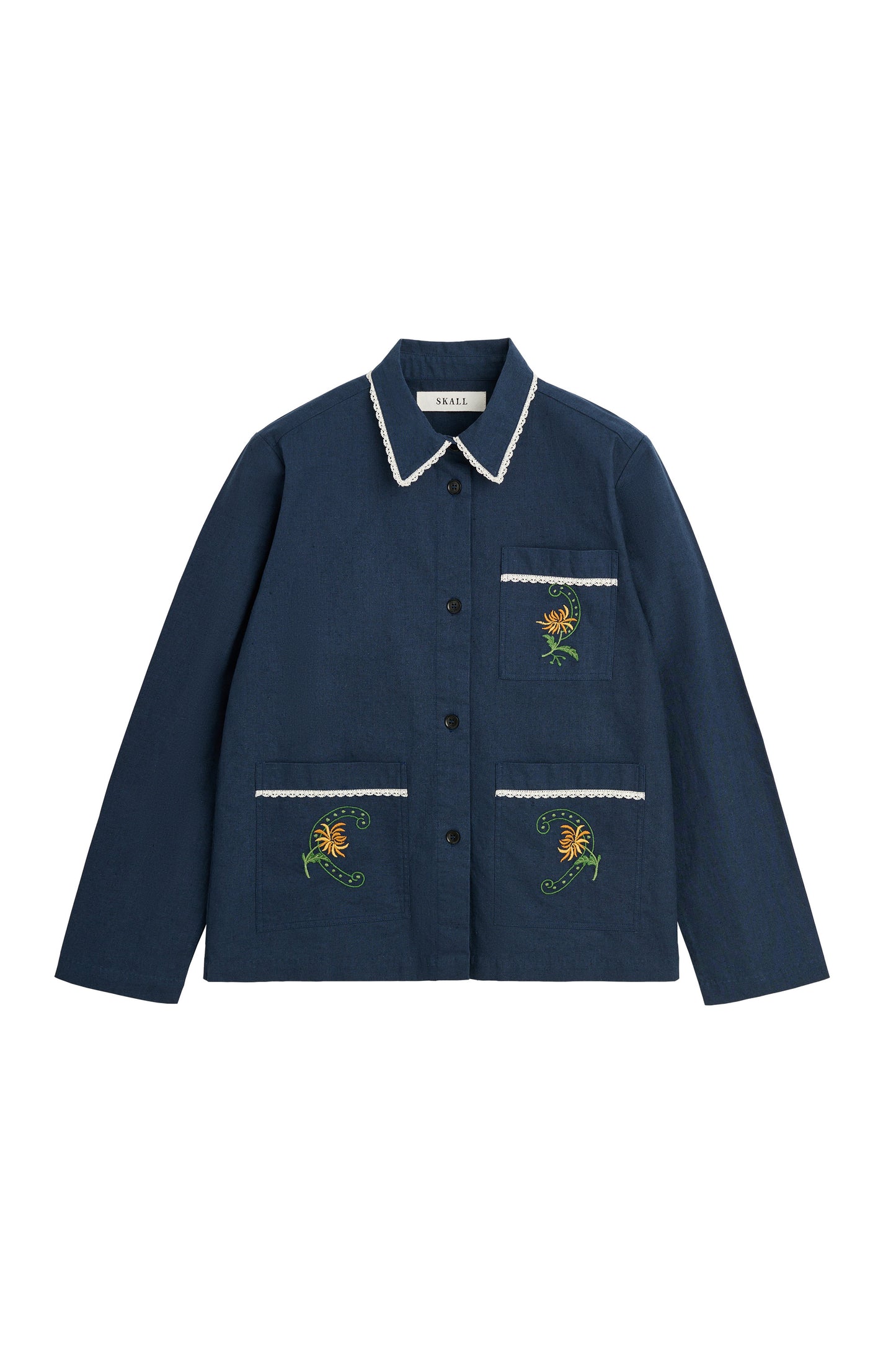 A navy blue button-up jacket with white trim on the collar and pocket edges, featuring embroidered yellow flowers with green stems on the chest and lower front pockets.