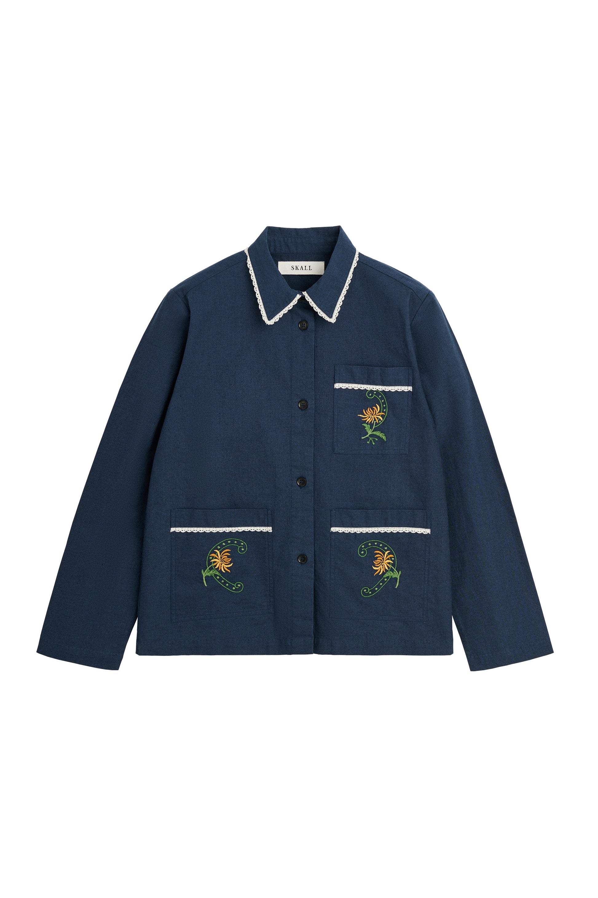 A navy blue button-up jacket with white trim on the collar and pocket edges, featuring embroidered yellow flowers with green stems on the chest and lower front pockets.