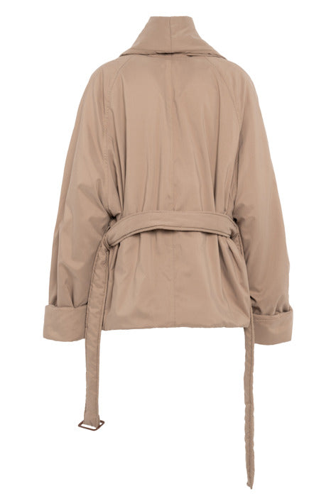 A beige trench coat shown from the back, featuring a collar, long sleeves with rolled cuffs, and a matching waist tie belt, displayed on a clean white background.