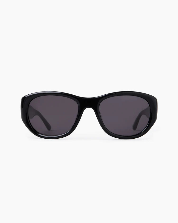 Black sunglasses with dark lenses on a white background