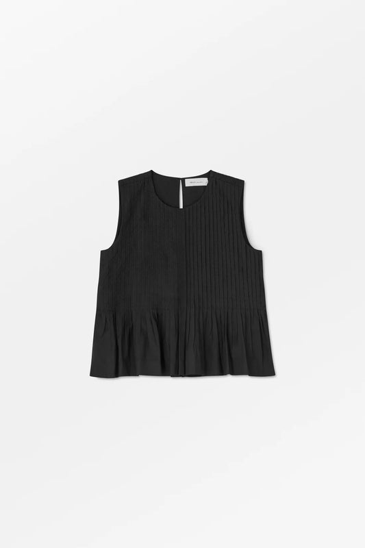 Black sleeveless top on a light gray background