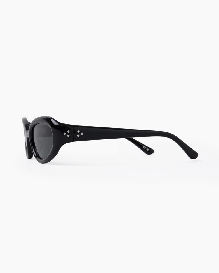 Sunglasses with black frame and dark lenses on a white background