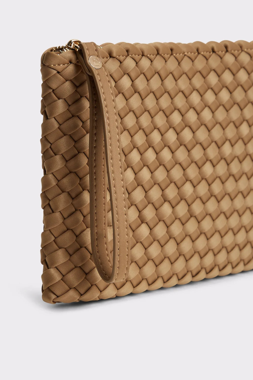 A close-up of a woven leather clutch or pouch in tan, showing the detailed basketweave texture, a top zipper with gold-tone hardware, and a matching leather wristlet strap on a light gray background.