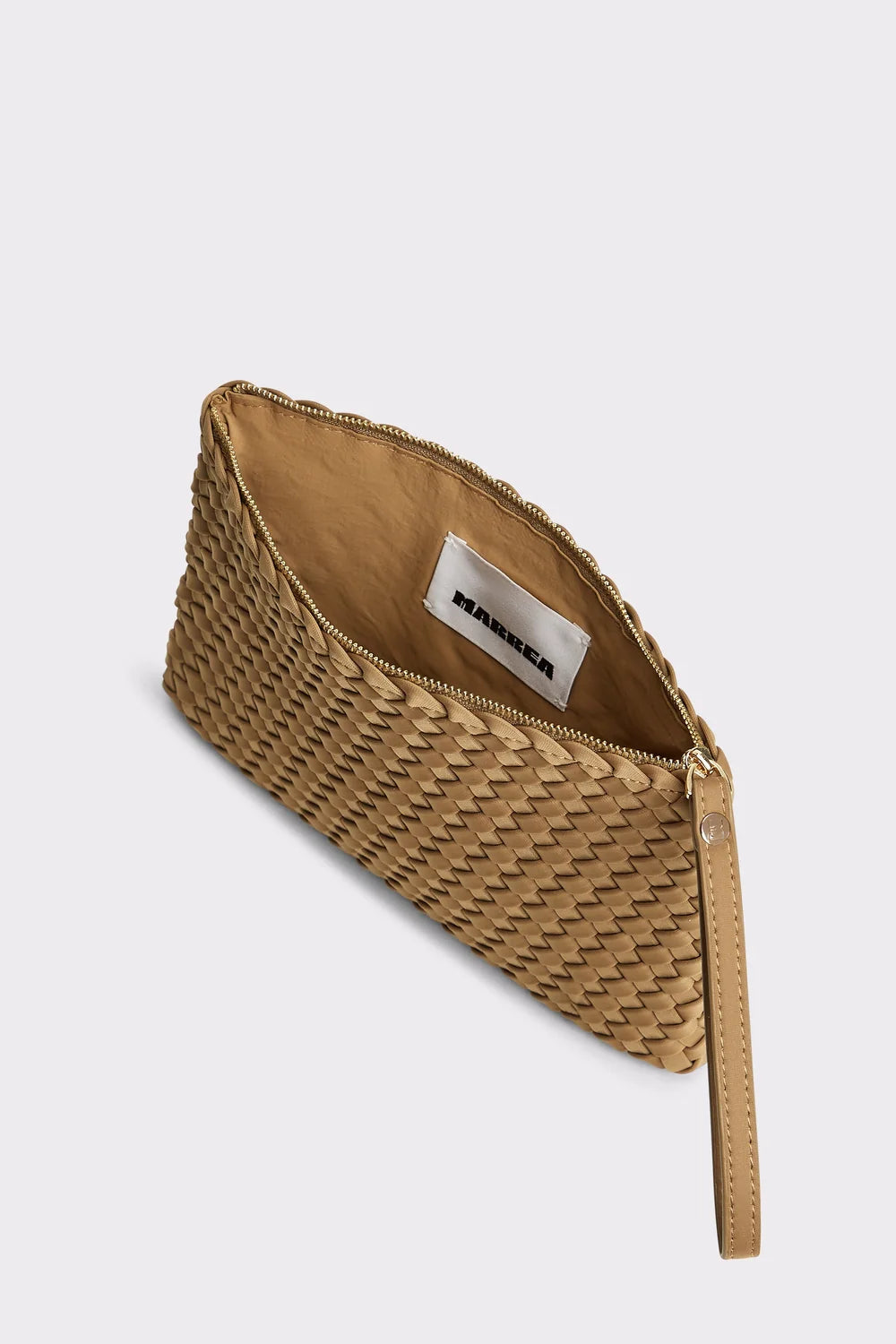 A woven tan leather clutch bag with a top zipper and wrist strap, shown open on a light gray background. The interior features a tan lining with a white brand label reading 'MINKER'.