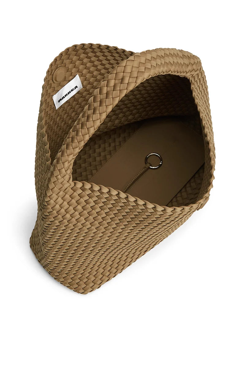 A woven straw tote bag in a natural tan color, shown from an overhead angle on a white background. The brand name 'MAMAMOO' is visible on a small white label sewn onto the side.