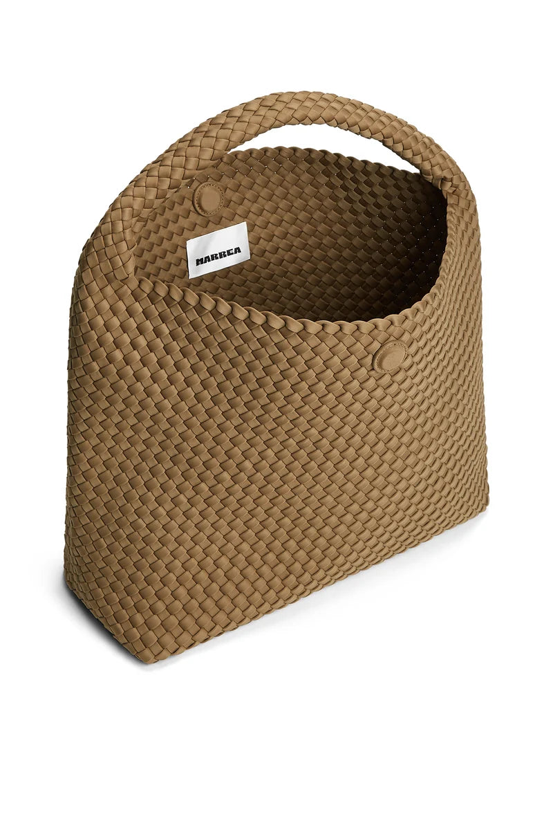A woven brown basket bag with a top handle, featuring a white brand label that reads 'BUNNEN' on the inside, set against a plain white background.