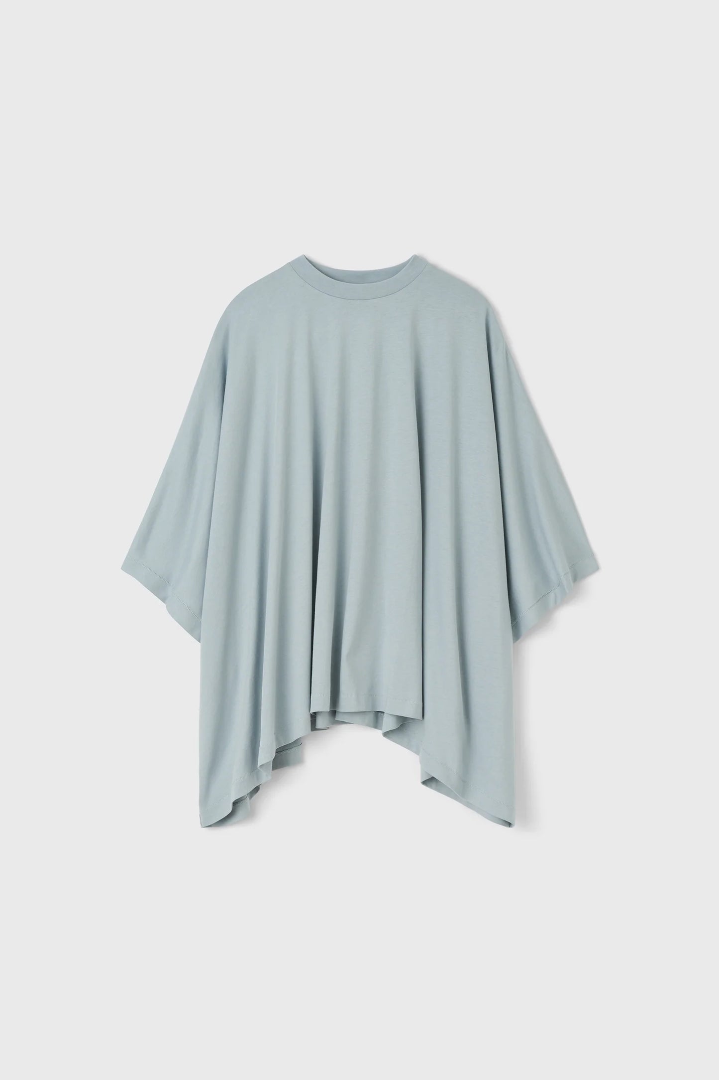 Light blue poncho on a white background