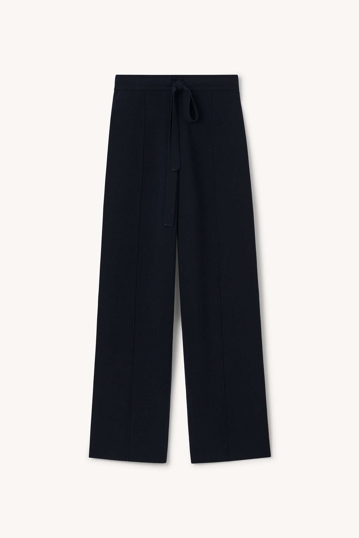 A pair of dark navy wide-leg trousers with a matching fabric drawstring waist, displayed flat against a clean off-white background.