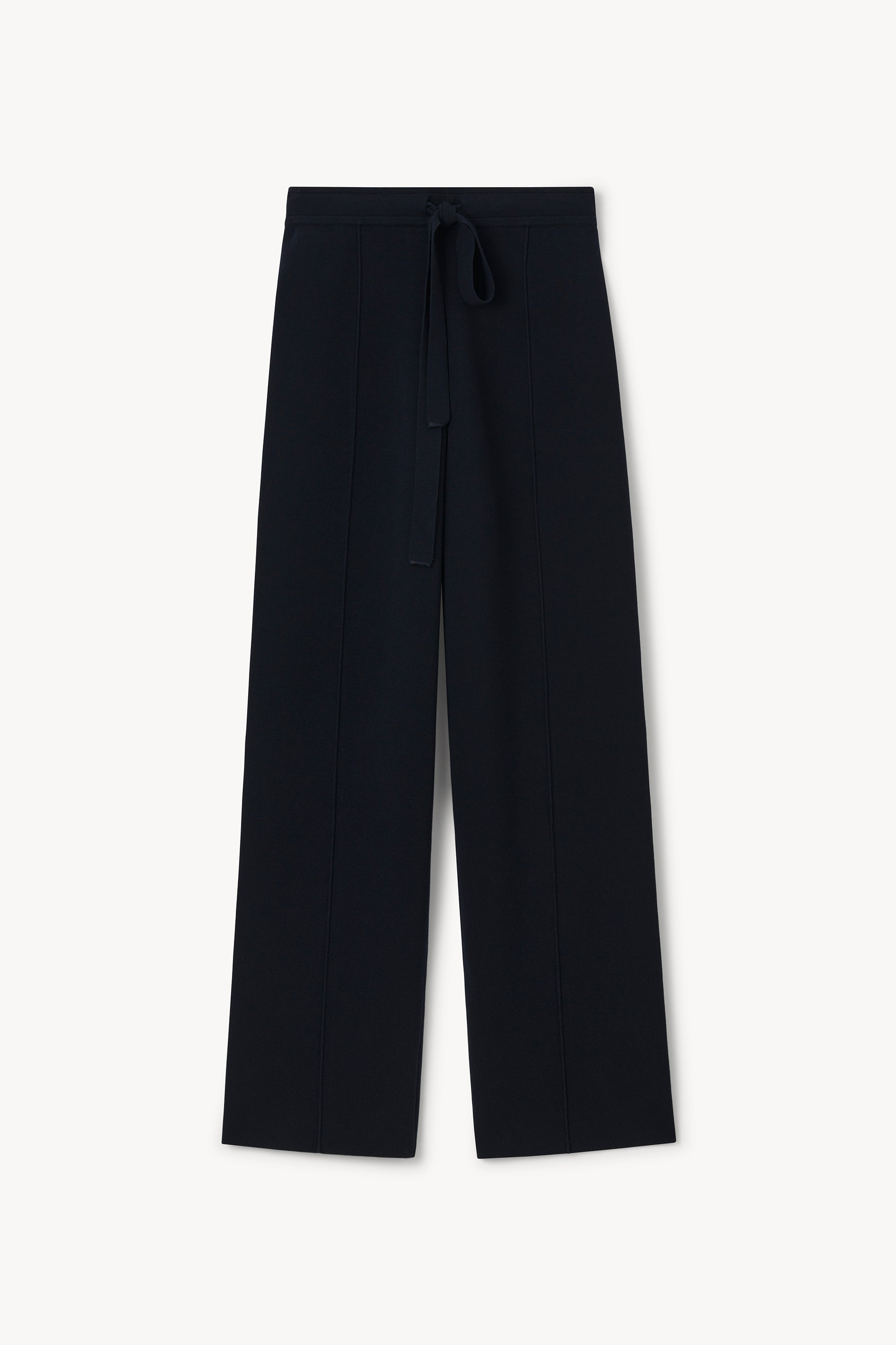 A pair of dark navy wide-leg trousers with a matching fabric drawstring waist, displayed flat against a clean off-white background.