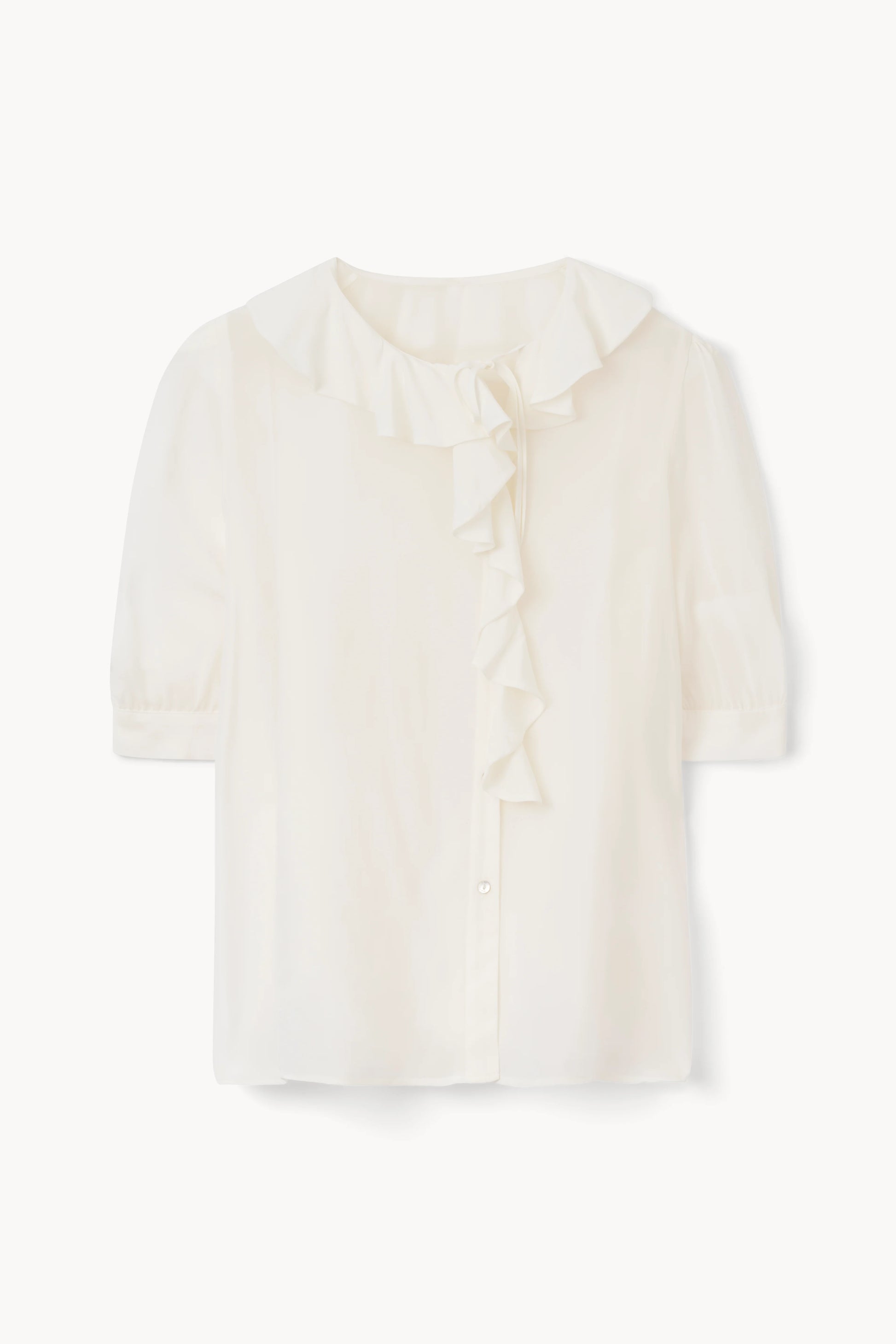 Iconic Rodebjer piece. Short, puff sleeve blouse with flounces along neckline and front packshot