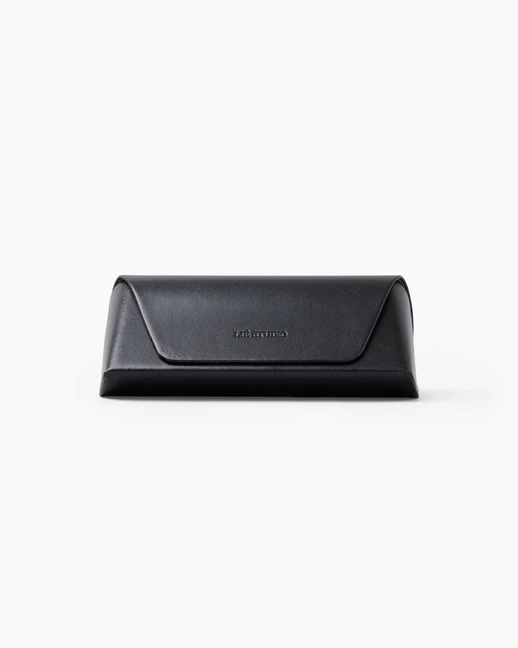 Black leather clutch bag on a white background