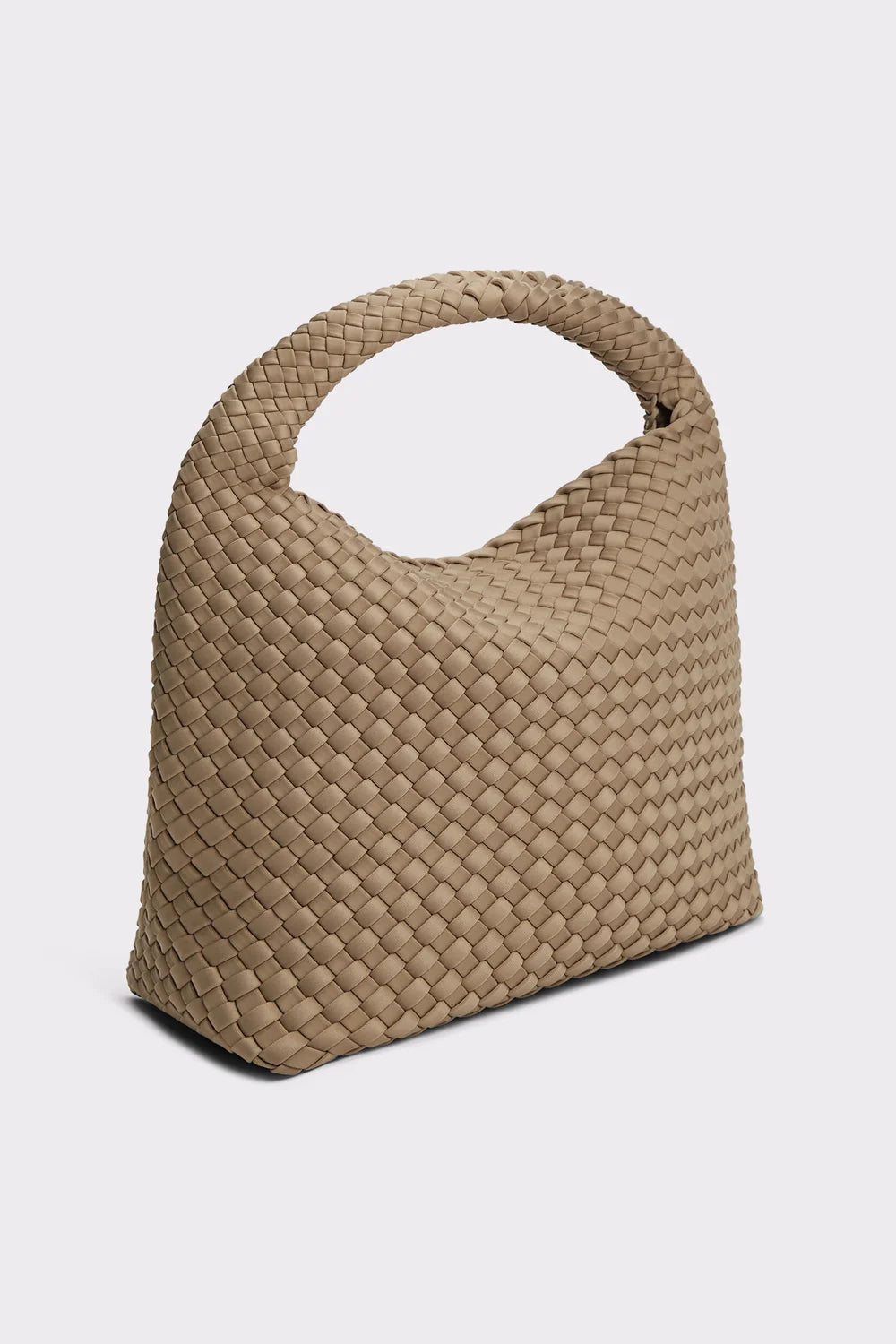 A woven leather shoulder bag in a light tan color, featuring a single integrated top handle and a structured, slouchy silhouette, shown against a plain light gray background.