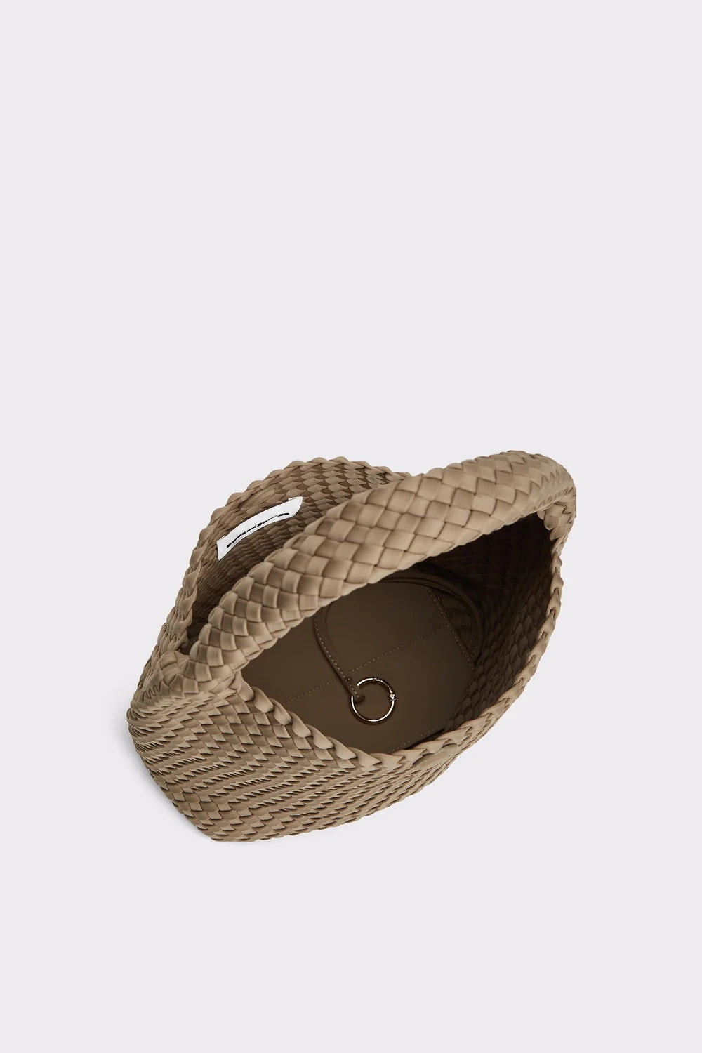 Woven beige hat on a light gray background