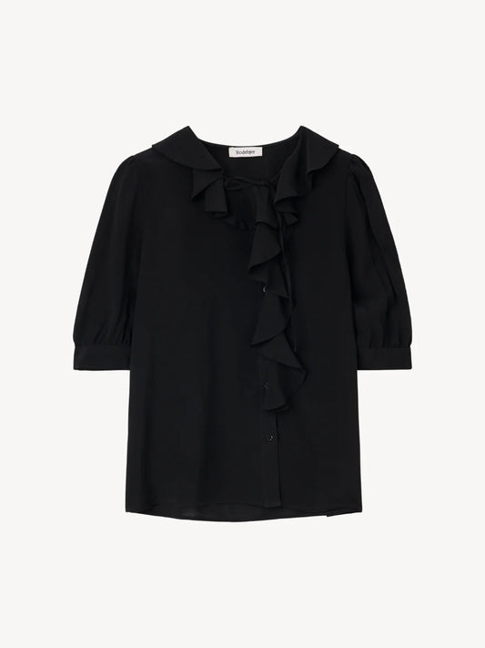 A black long-sleeve blouse with a ruffled Peter Pan collar, bow detail at the neckline, and cascading ruffles down the front center, shown against a plain light background.