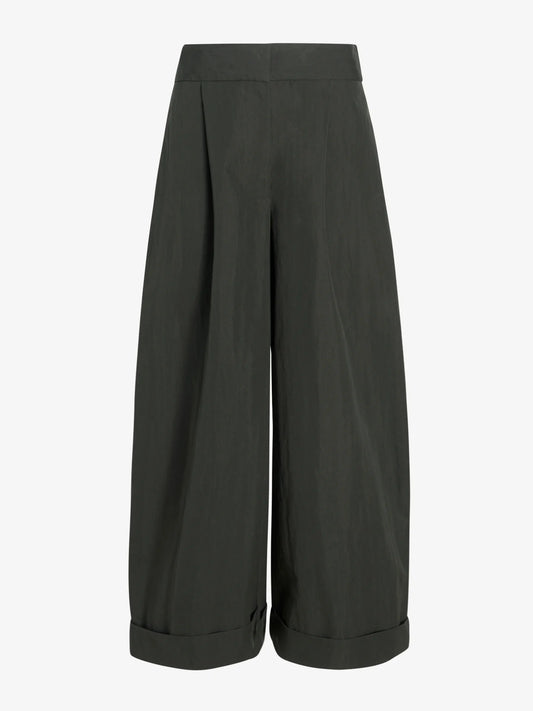 dark green wide-leg pants on a light gray background