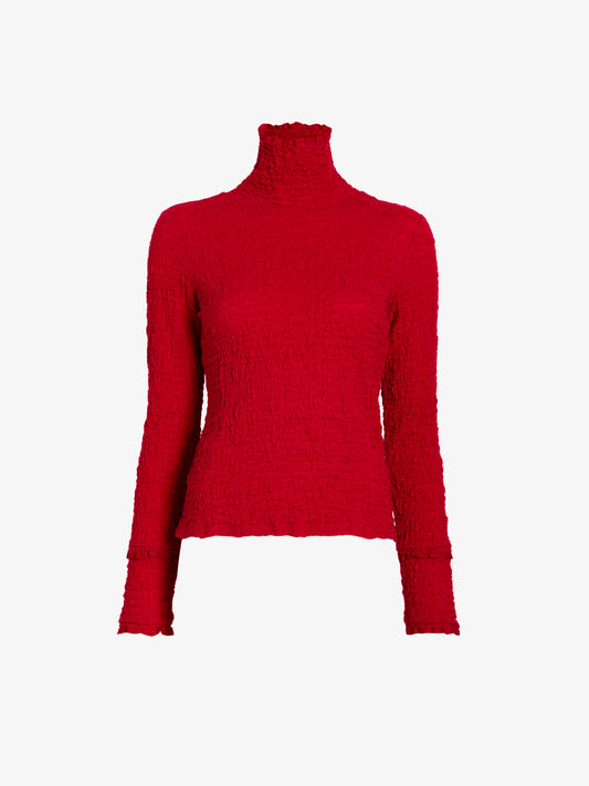 A bright red textured knit turtleneck sweater displayed on a ghost mannequin against a plain white background.