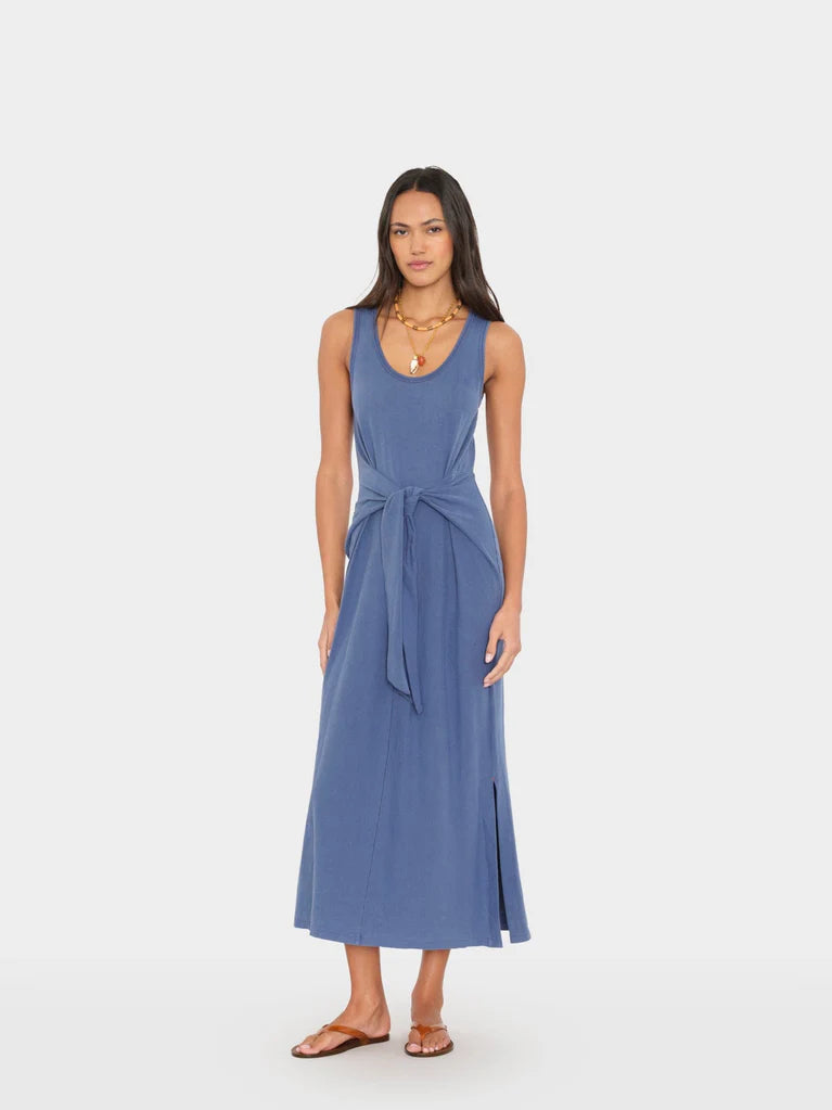 Woman wearing a blue dress on a white background