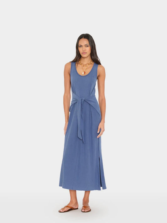 Woman wearing a blue dress on a white background